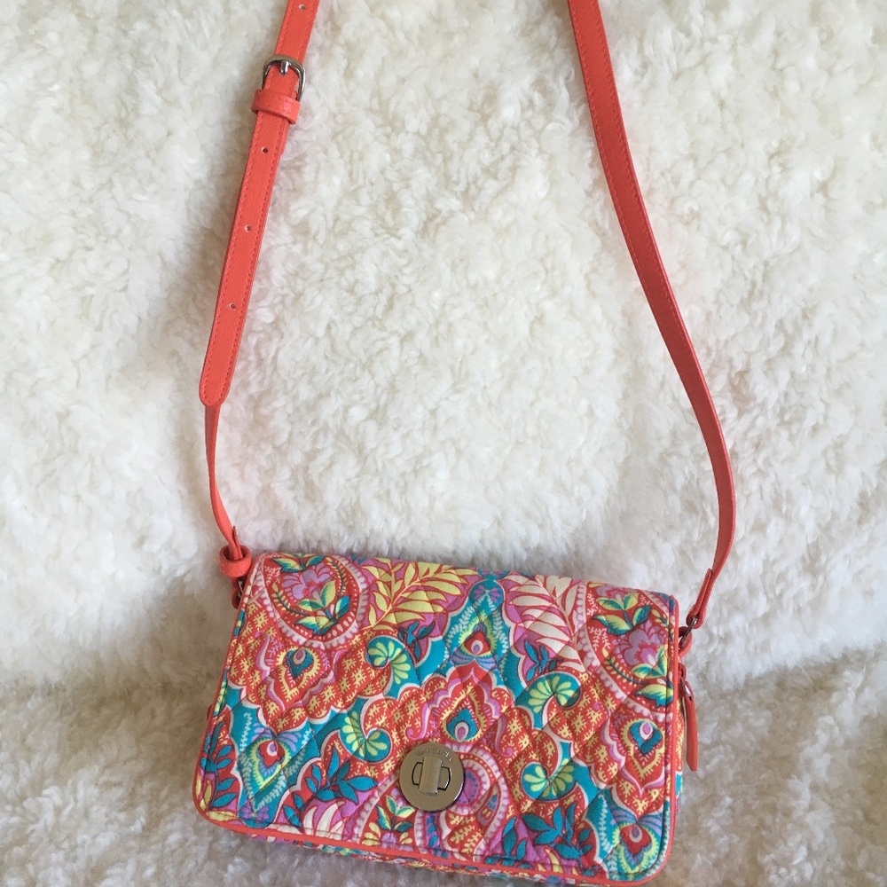 Small, but bigger than a wallet shoulder bag.